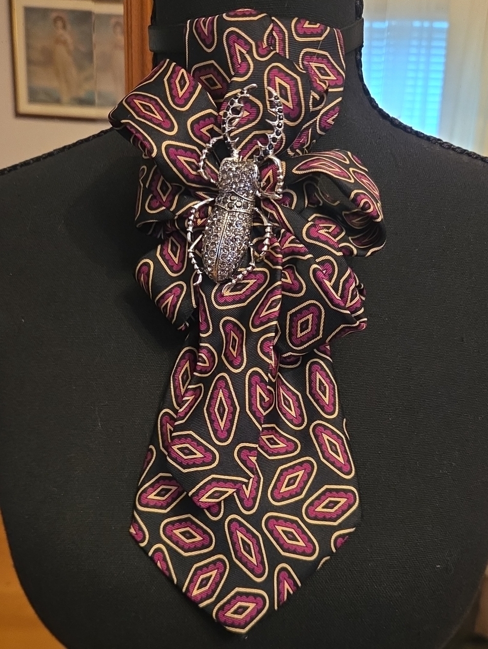 Decorative Black and Purple Scarf Tie with Beetle Brooch